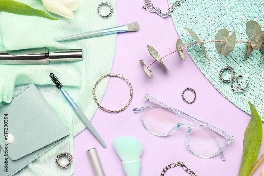 Composition with stylish female accessories and cosmetics on color background