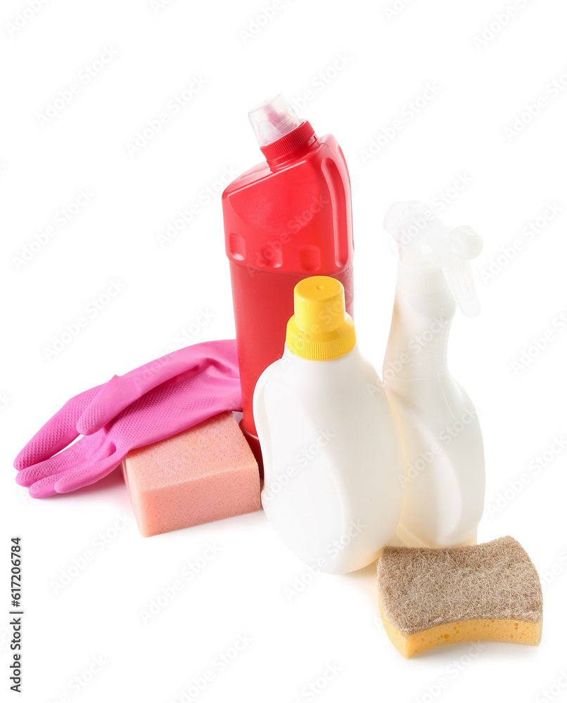 Different cleaning supplies on white background