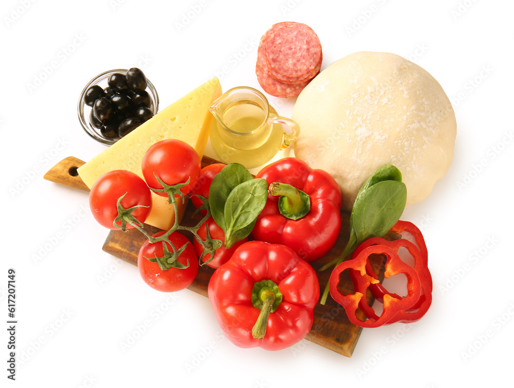 Raw dough and ingredients for preparing pizza on white background