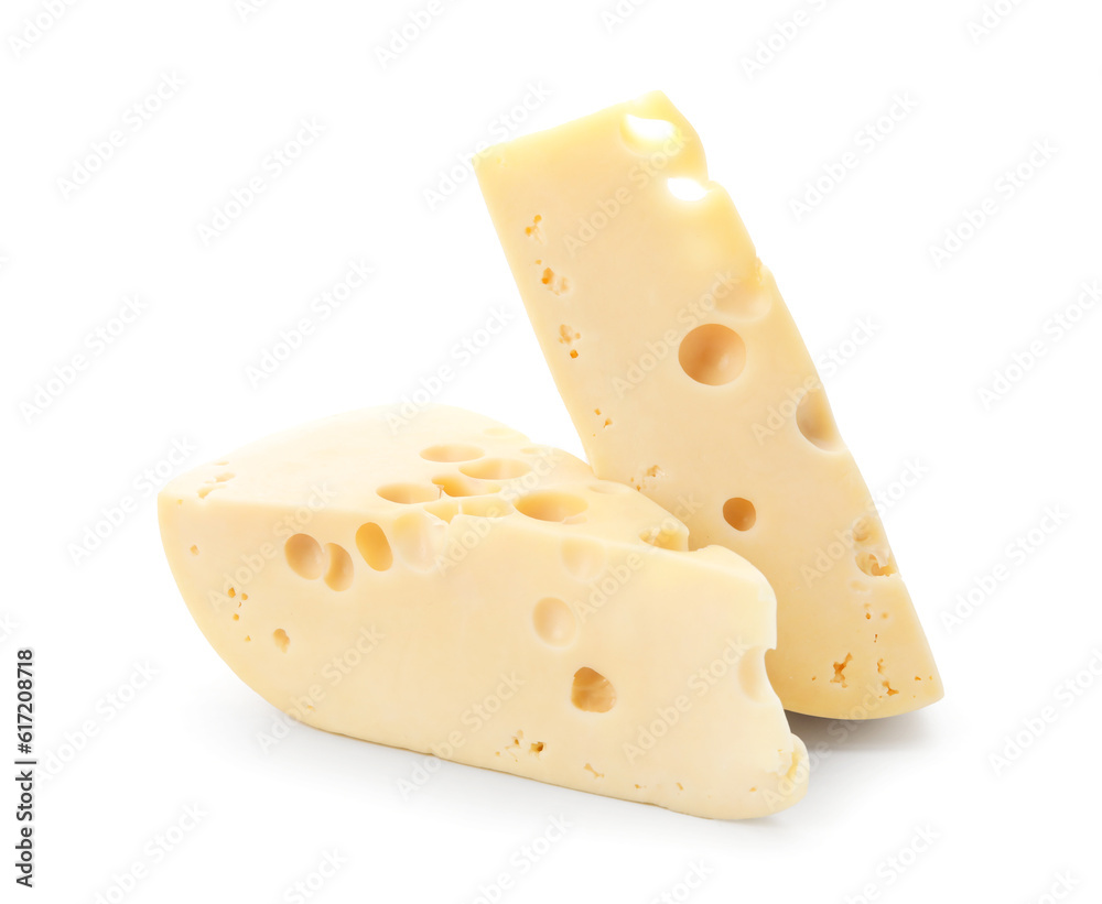 Pieces of tasty Swiss cheese on white background