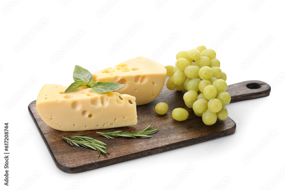 Wooden board with tasty Swiss cheese and grapes on white background