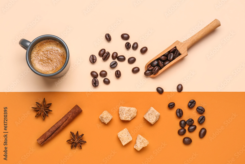 Cup of hot espresso, sugar, cinnamon and coffee beans on color background