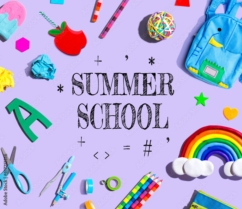 Summer School theme with school supplies on a purple background - flat lay