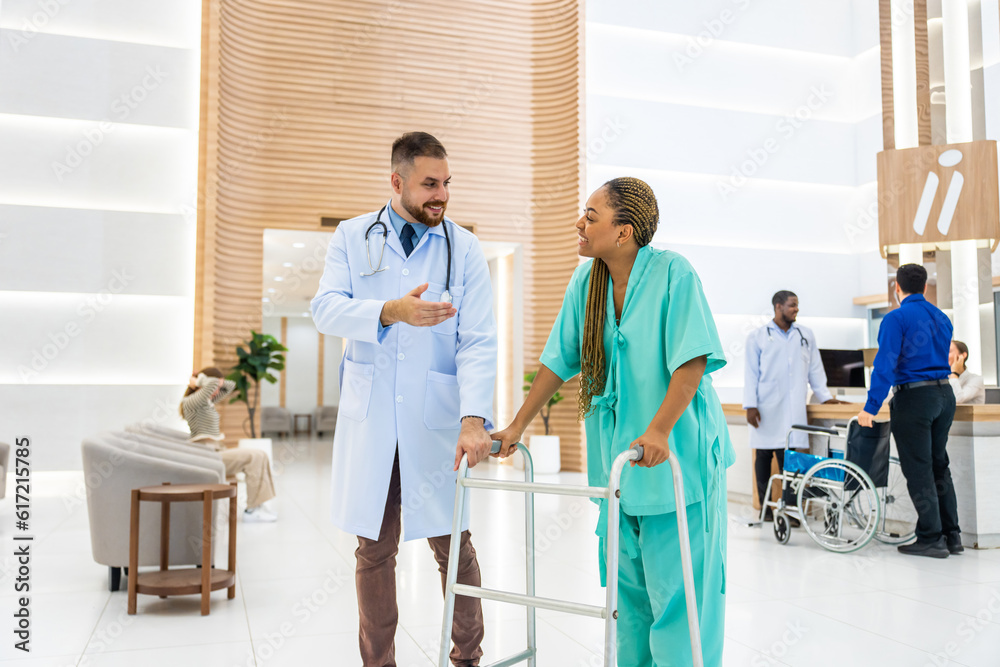 Caucasian doctors support patient walk through the hallway in hospital. 