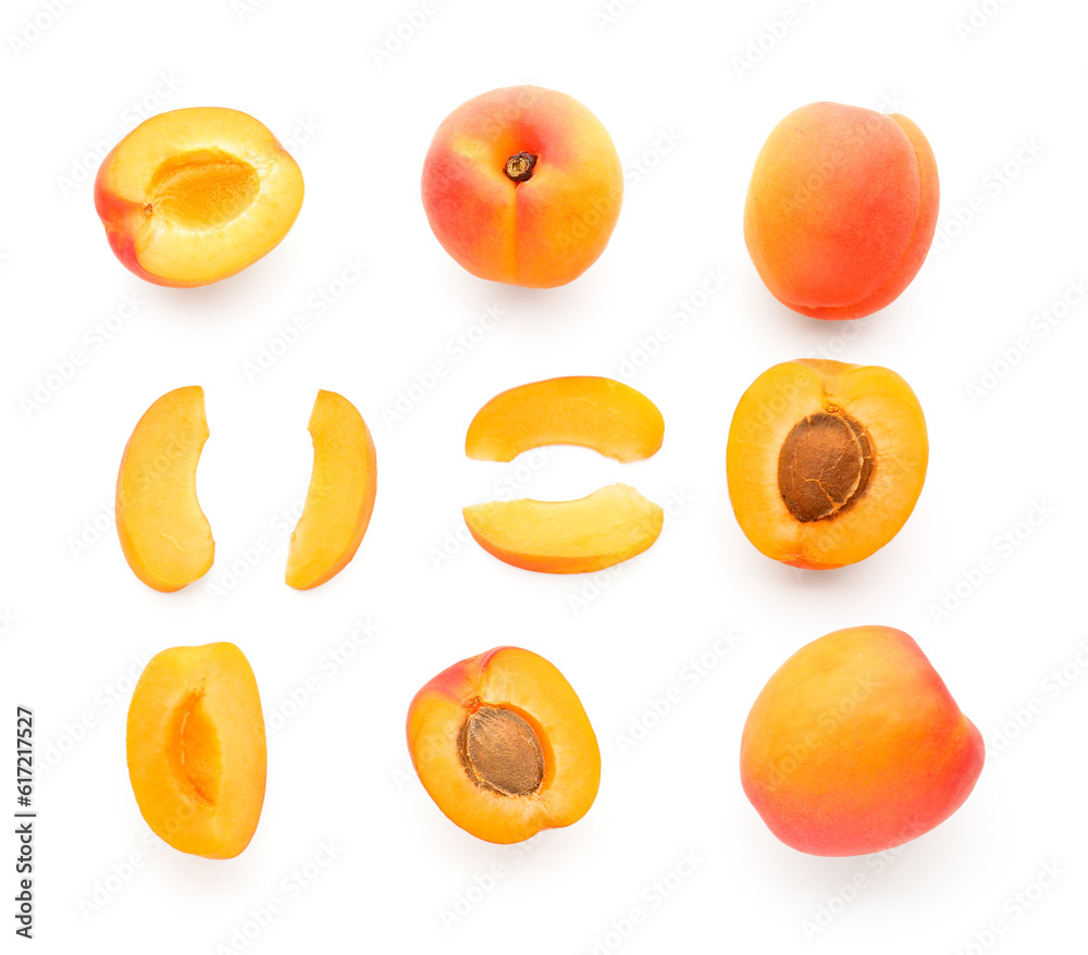 Composition with ripe apricots on white background