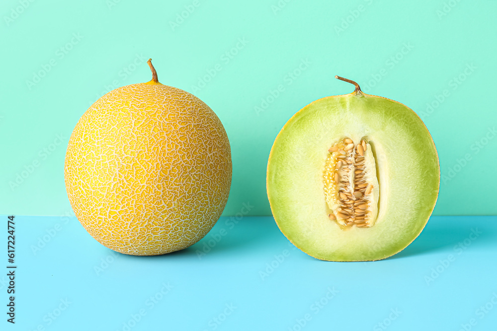 Sweet melon with half on blue background