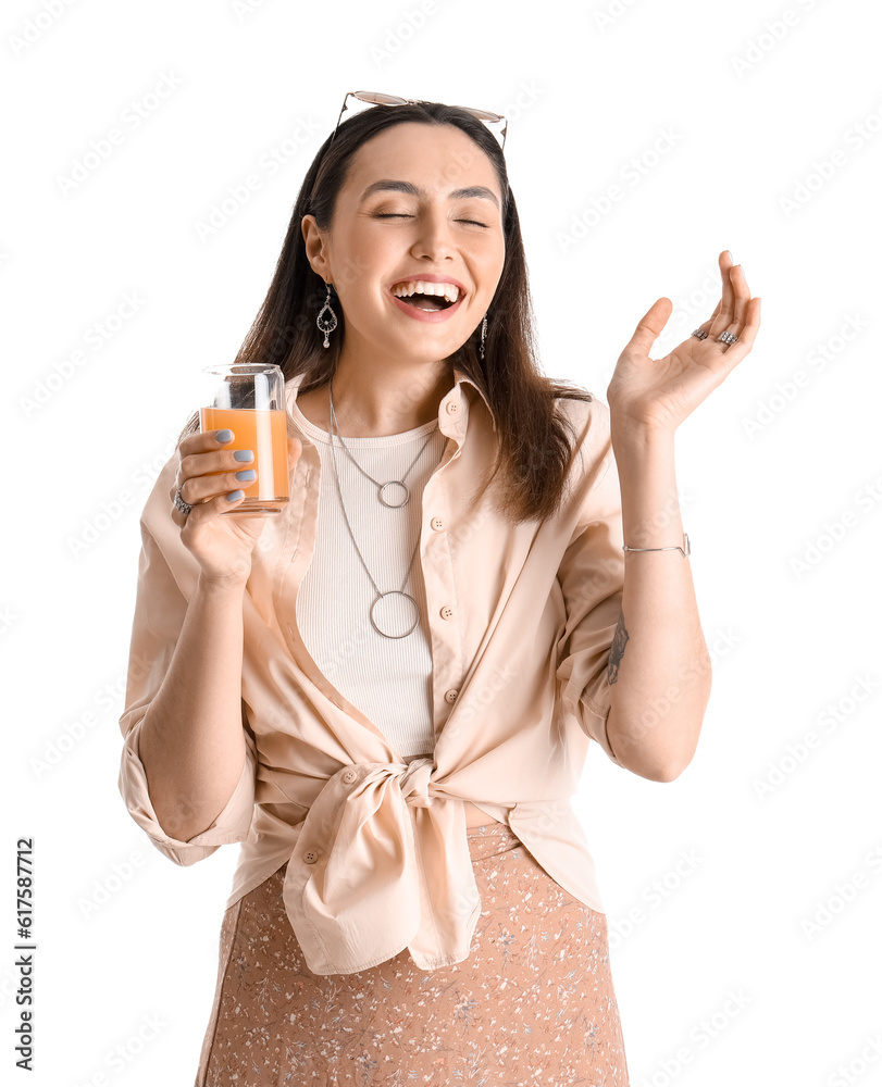 Young woman with glass of vegetable juice on white background