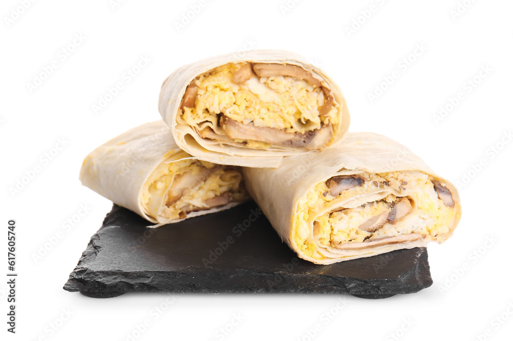 Slate board of tasty lavash rolls with egg and mushrooms isolated on white background