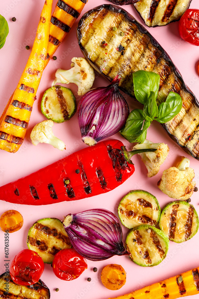 Grilled vegetables on pink background