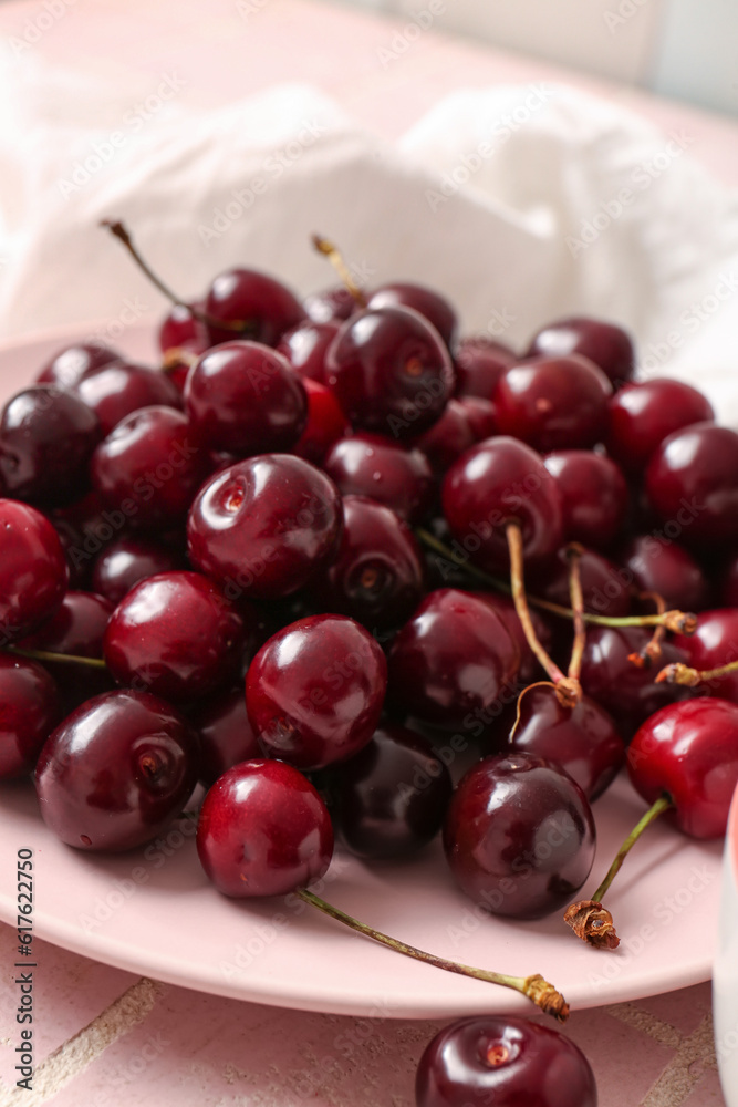 Plate with sweet cherries, closeup