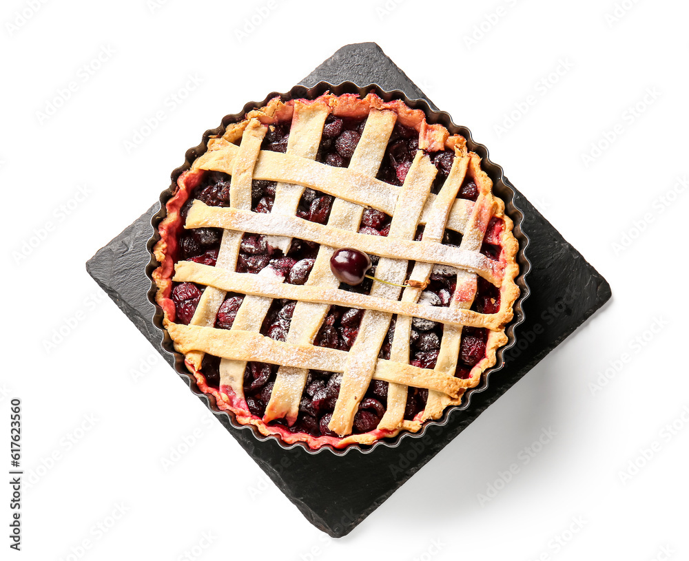 Baking dish with tasty cherry pie on white background