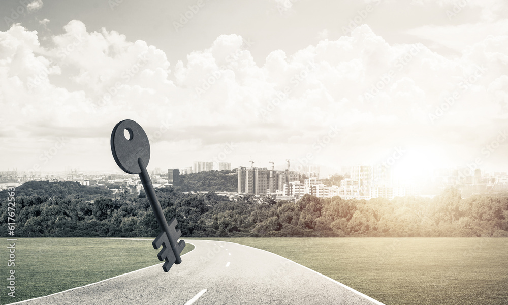 Conceptual background image of concrete key sign on asphalt road