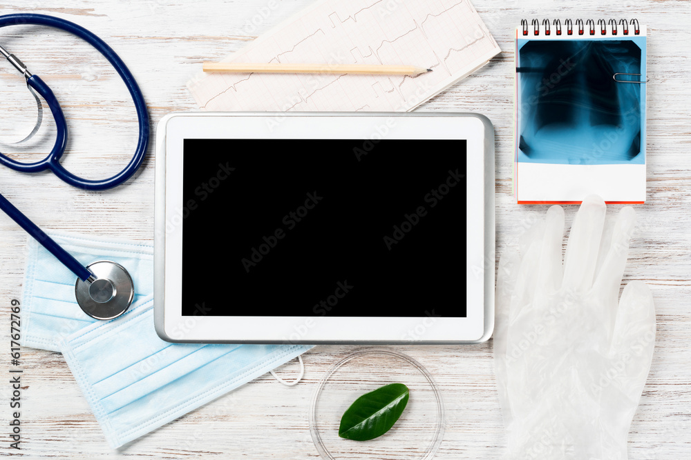 Mock up of doctors desktop with medical supplies