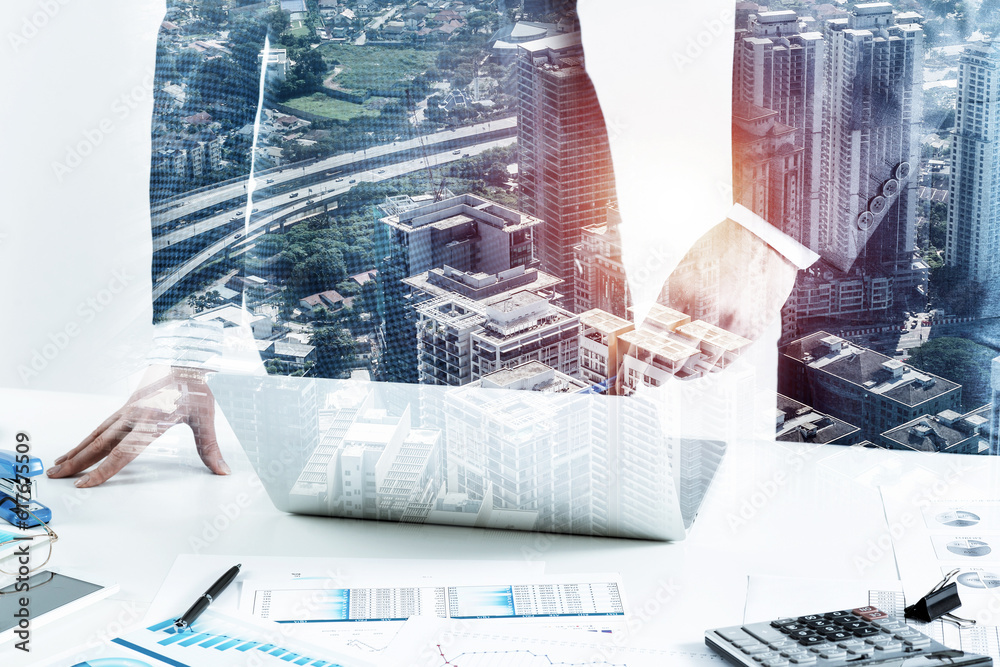 Businesspersons stand near office desk