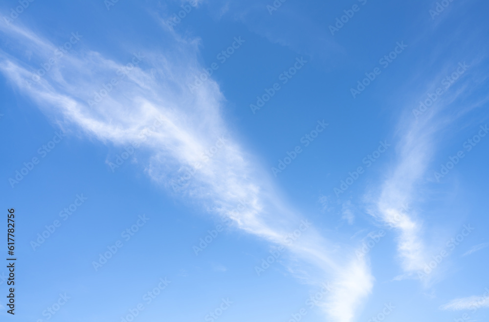 Blue sky and white cirrocumulus clouds texture background. Blue sky on sunny day. Summer sky. Cloud 