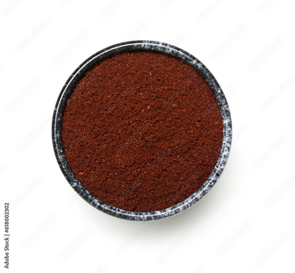 Bowl of coffee powder isolated on white background