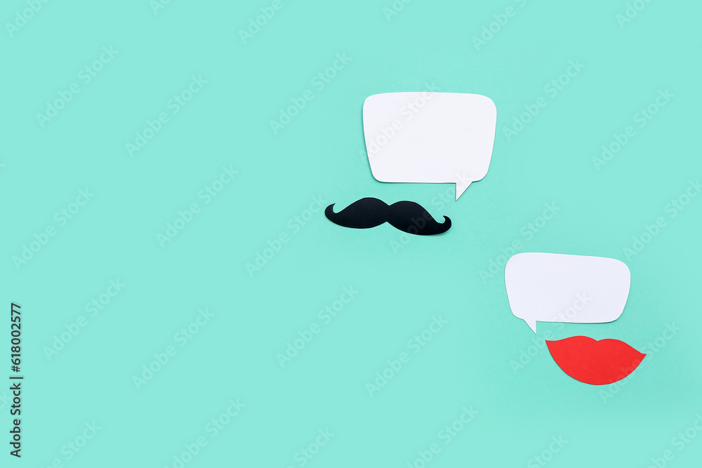 Paper mustache and lips with speech bubbles on mint background. Dialogue concept