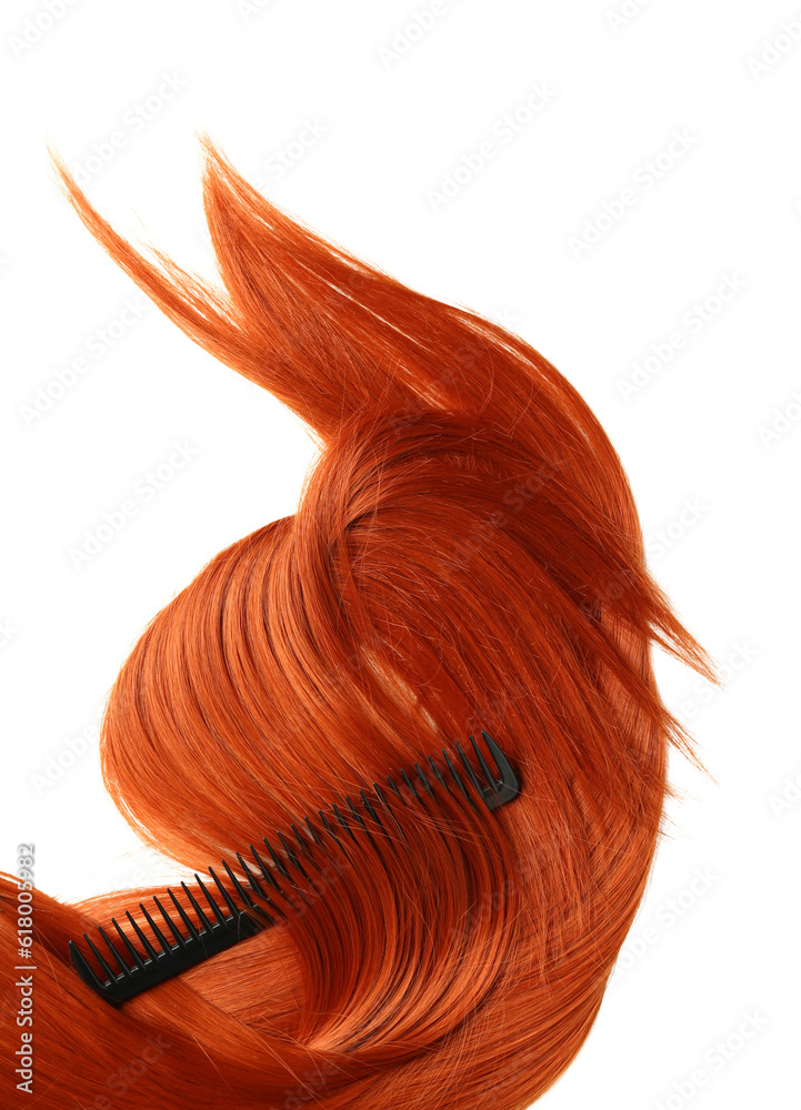 Ginger hair with comb on white background, closeup