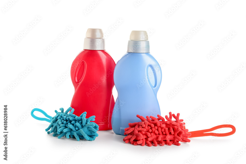 Bottles of detergent and microfiber mops isolated on white background