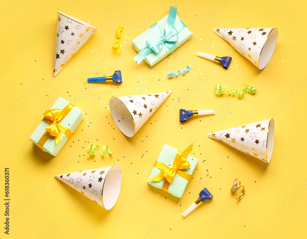 Different party decor on yellow background