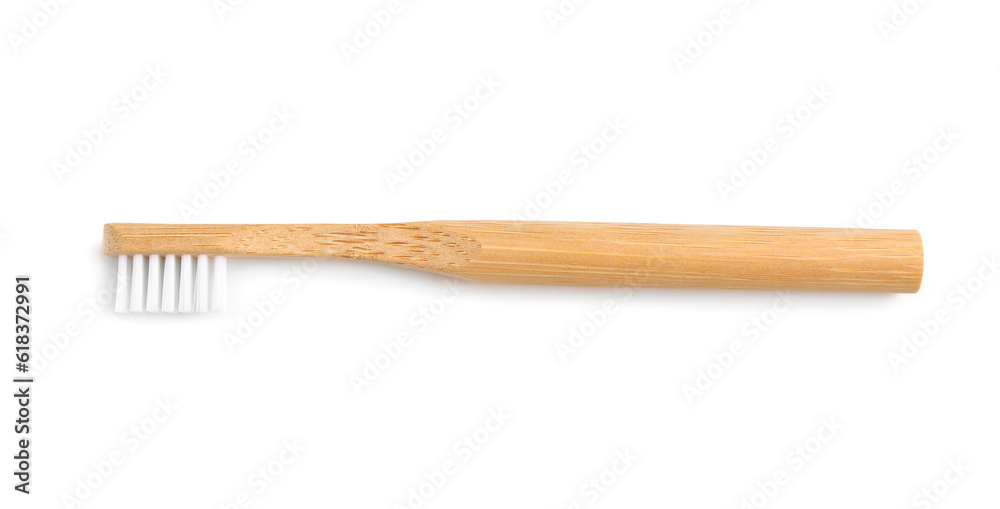 Bamboo tooth brush on white background