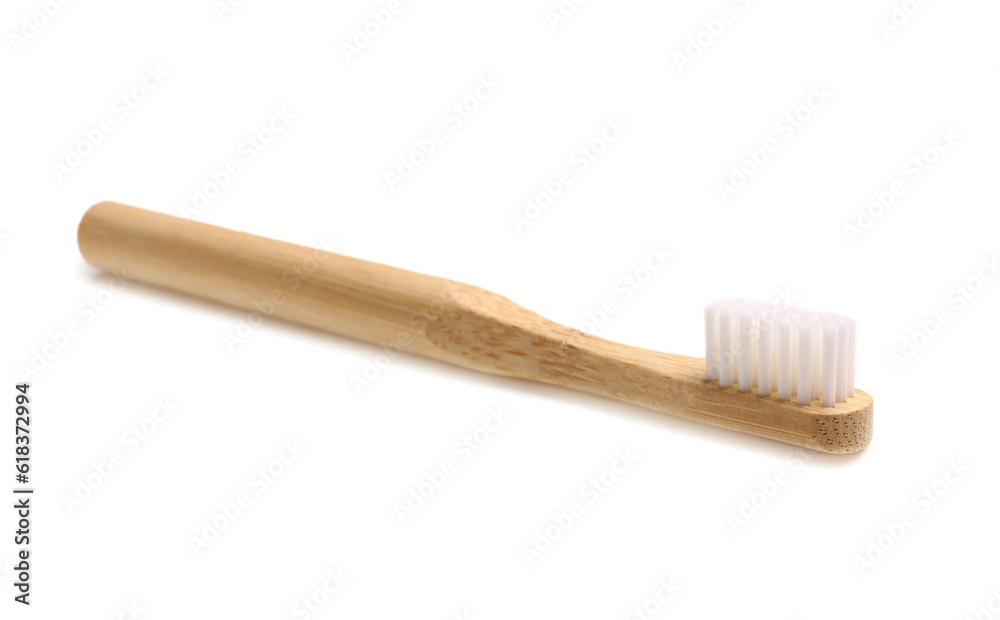 Bamboo tooth brush on white background