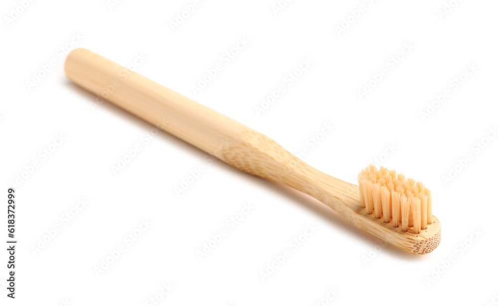 Bamboo tooth brush on white background