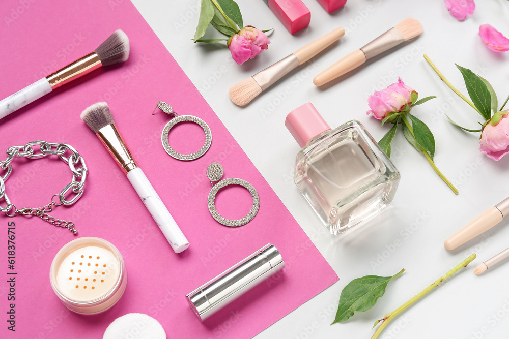 Composition with female accessories, cosmetics, makeup brushes and peony flowers on color background