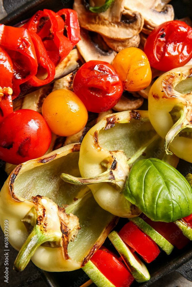 Tasty grilled vegetables in baking dish, closeup