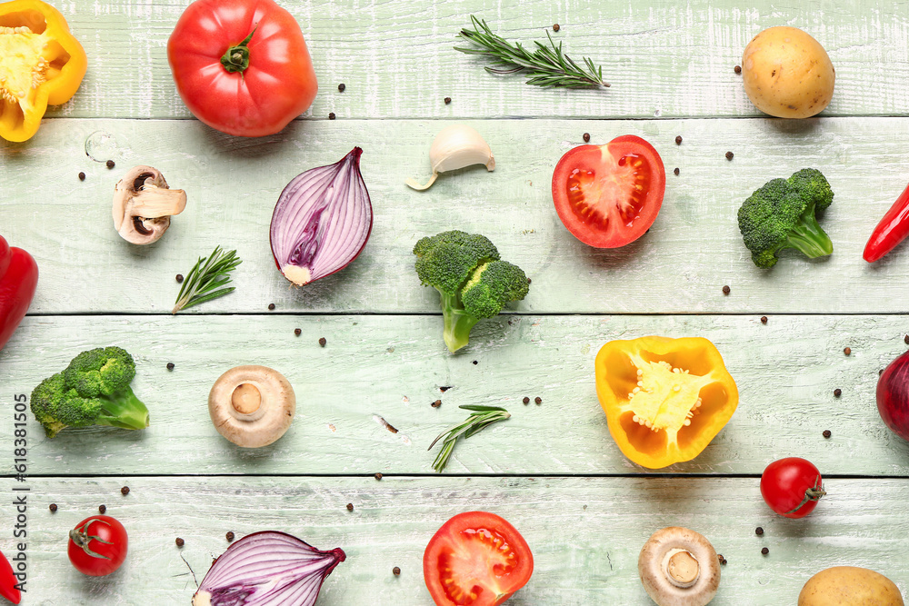 Fresh ripe vegetables on color wooden background