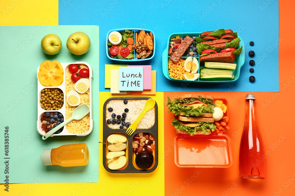 Different tasty food in lunchboxes and sticky notes with text LUNCH TIME on color background