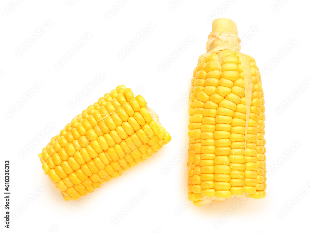 Cut fresh corn cobs on white background