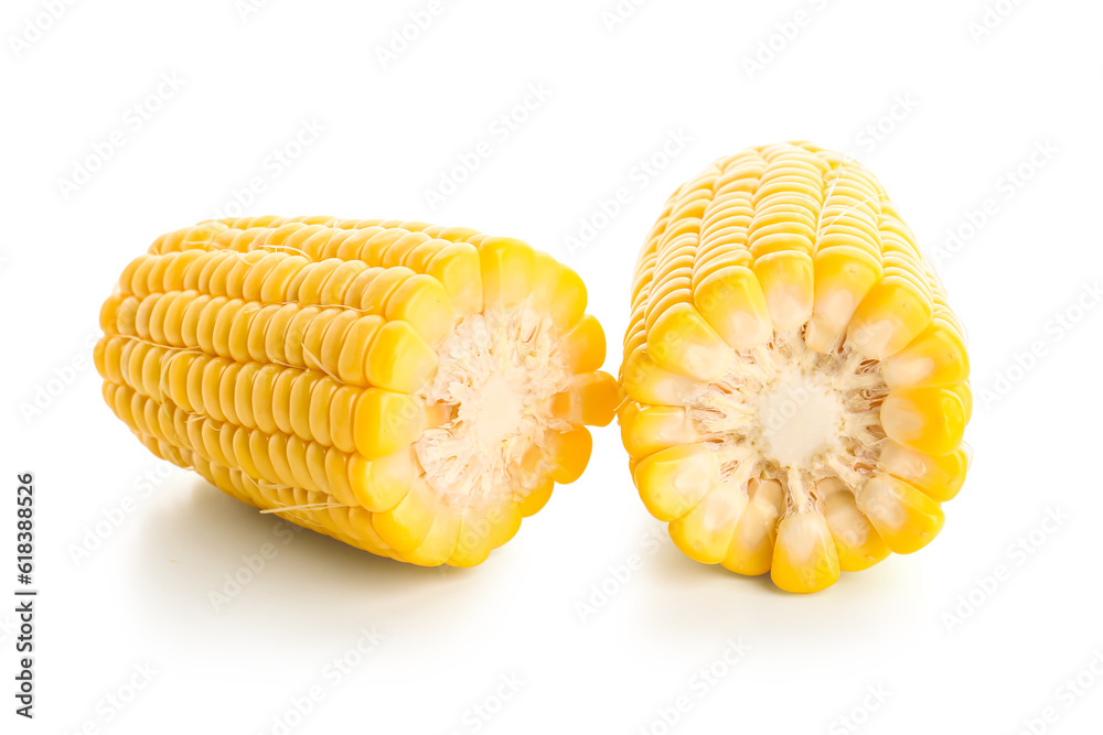 Cut fresh corn cobs on white background