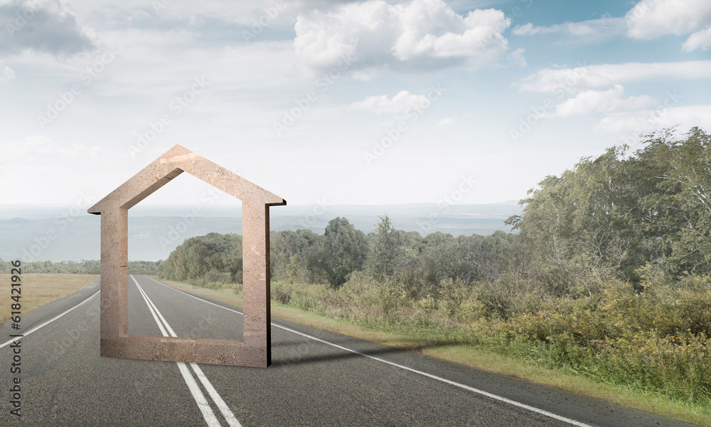 Conceptual background image of concrete home sign on asphalt road