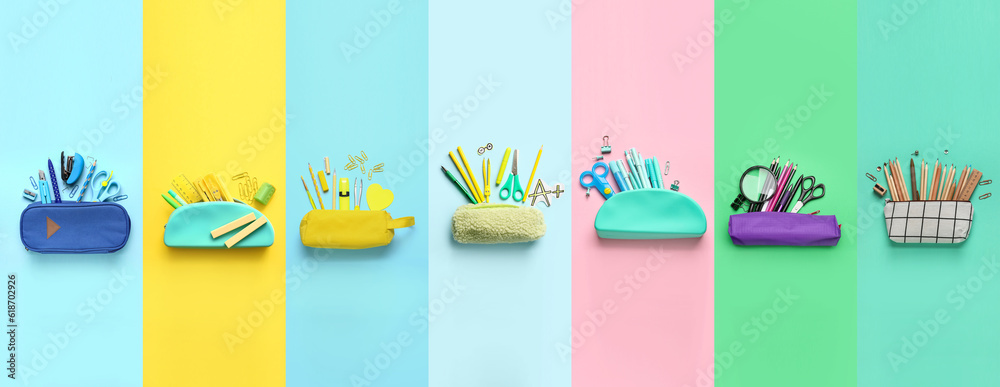 Set of pencil cases with school stationery on color background