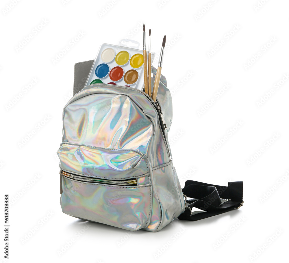 Hologram school backpack with watercolors and brushes on white background