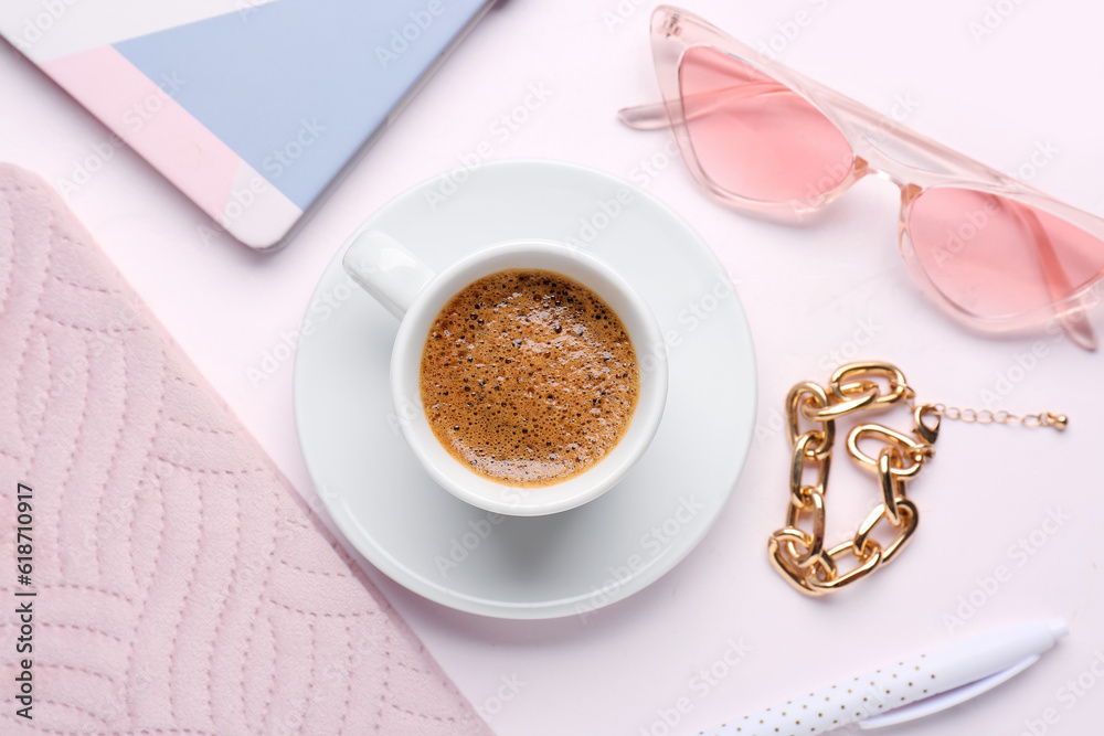 Cup of hot espresso and accessories on white background