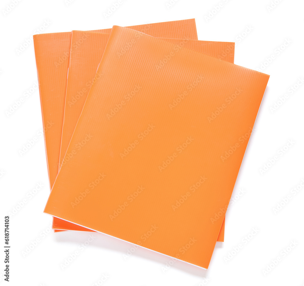 Orange notebooks isolated on white background