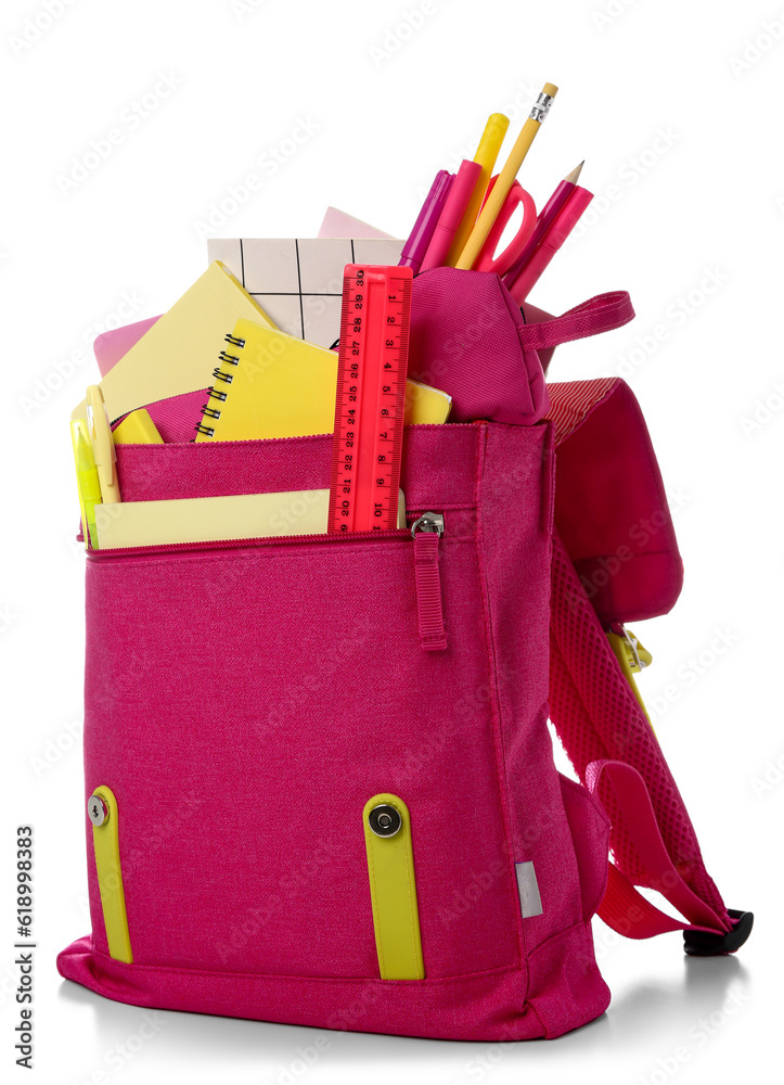 Pink school backpack with notebooks, ruler and pencils on white background