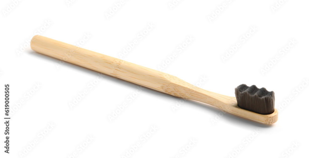 Bamboo tooth brush on white background