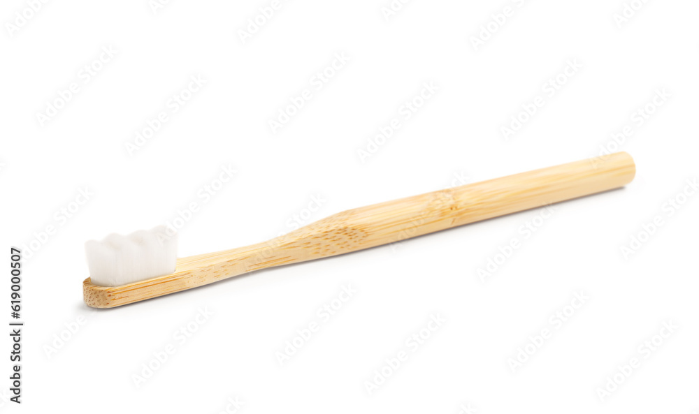 Bamboo tooth brush on white background