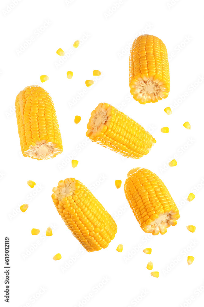 Cut fresh corn cobs and seeds on white background