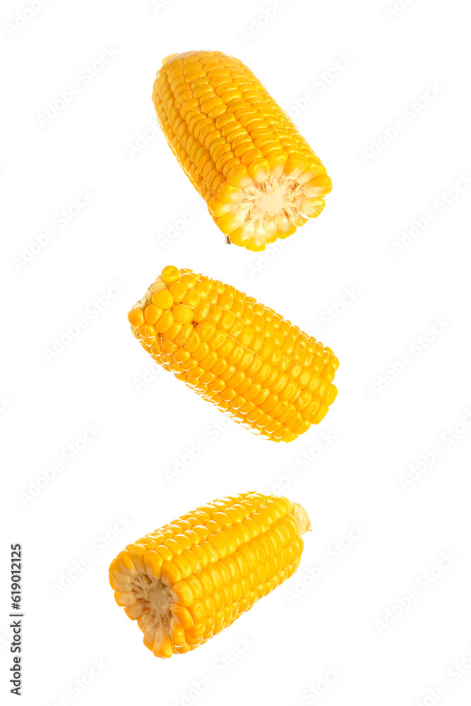 Cut fresh corn cobs on white background