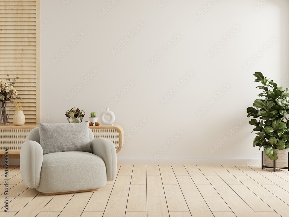 Modern interior of living room with gray armchair on empty white color wall background.