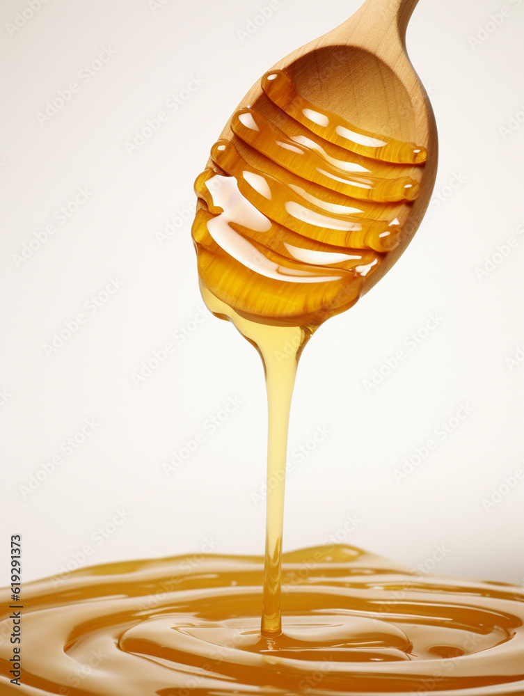 Honey falling from a wooden stick