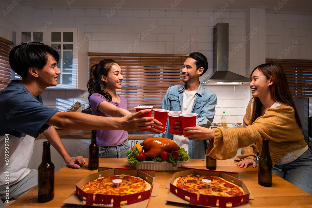 Group of Asian friend having dinner, enjoy evening party together at home. 