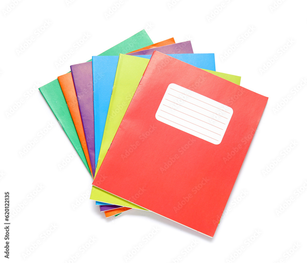 Different many colorful notebooks isolated on white background