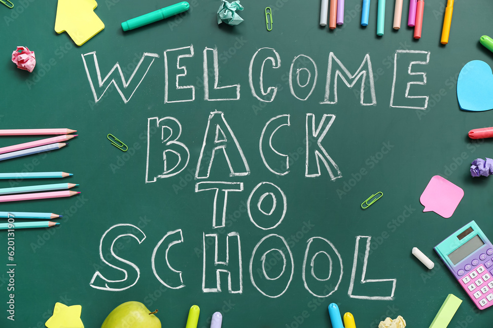 Different stationery with text WELCOME BACK TO SCHOOL on green chalkboard