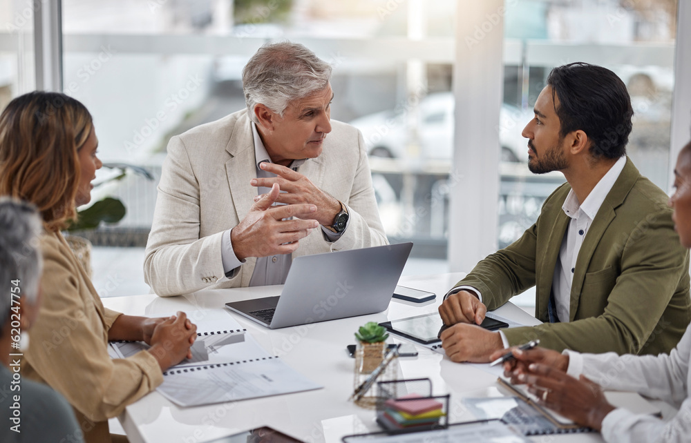 Businessman, laptop and teamwork with documents in meeting for strategy, planning or proposal at off