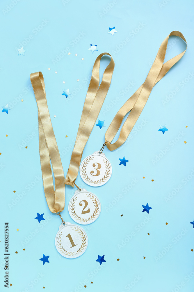 Prize medals with stars on blue background